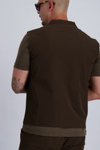 Les Brutes Tech Bodywarmer in dark brown. Perfect for layering and a casual or smart look. Premium quality with stretch