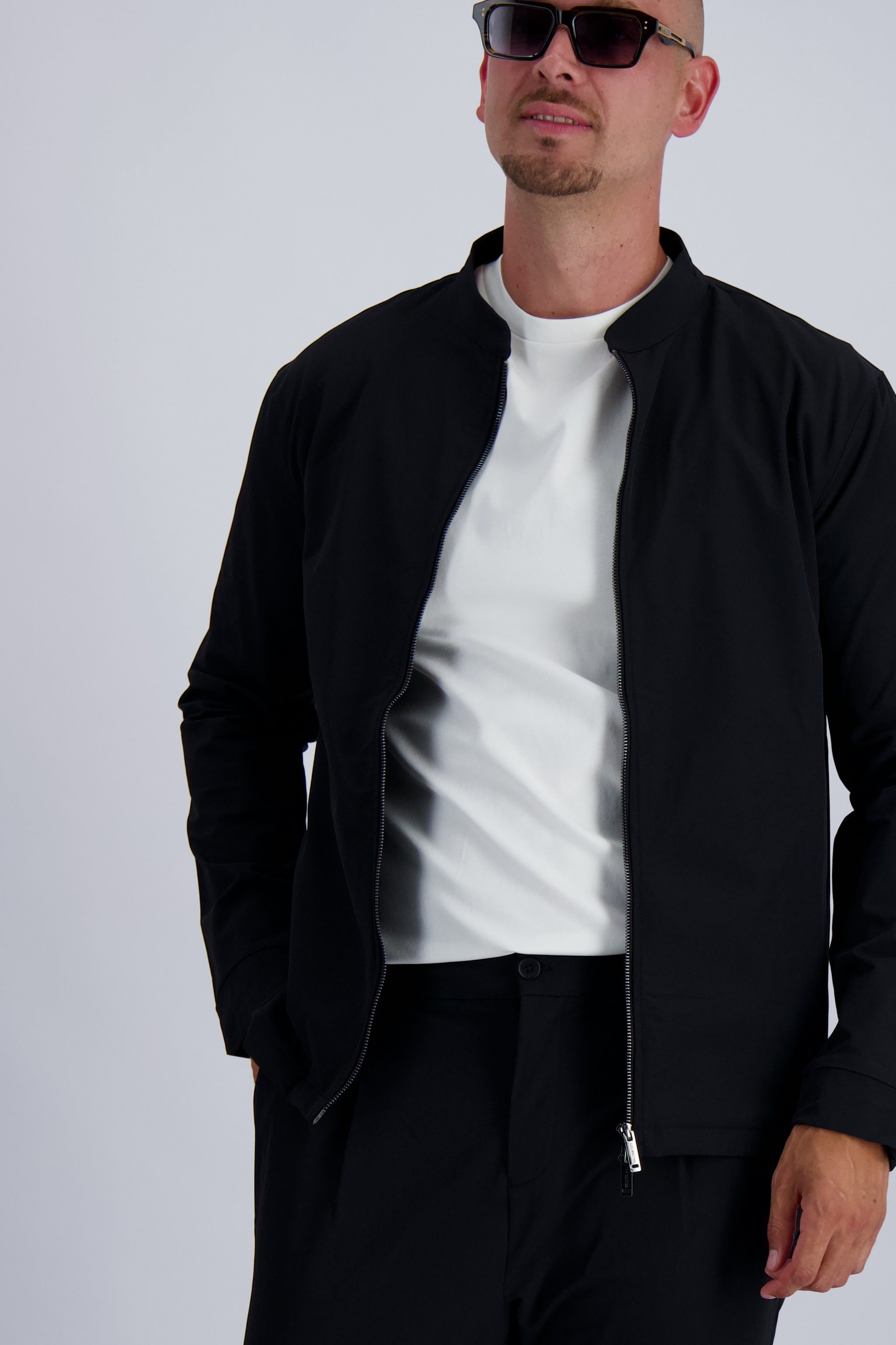 Les Brutes Tech Jacket in black. Crafted with premium materials for luxury looks and long lasting quality