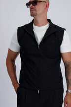 Les Brutes luxury Tech Bodywarmer in black. A premium essential for men who value timeless fashion and luxury. 