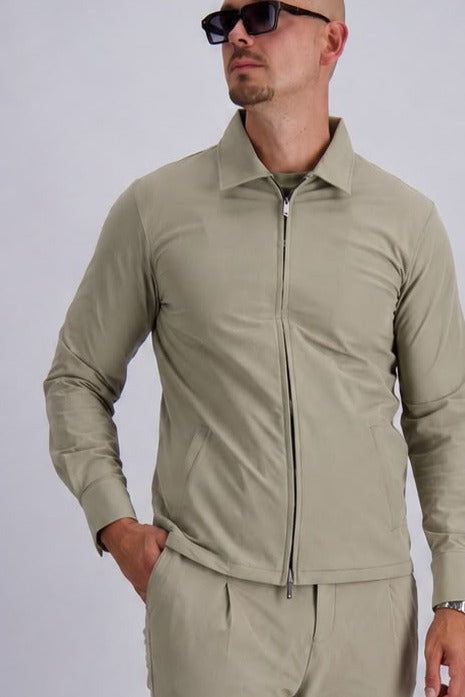 Les Brutes premium tech overshirt in beige. 