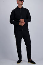 Les Brutes luxury Tech suit in black. A matching set including a Tech Jacket and trousers for men. 