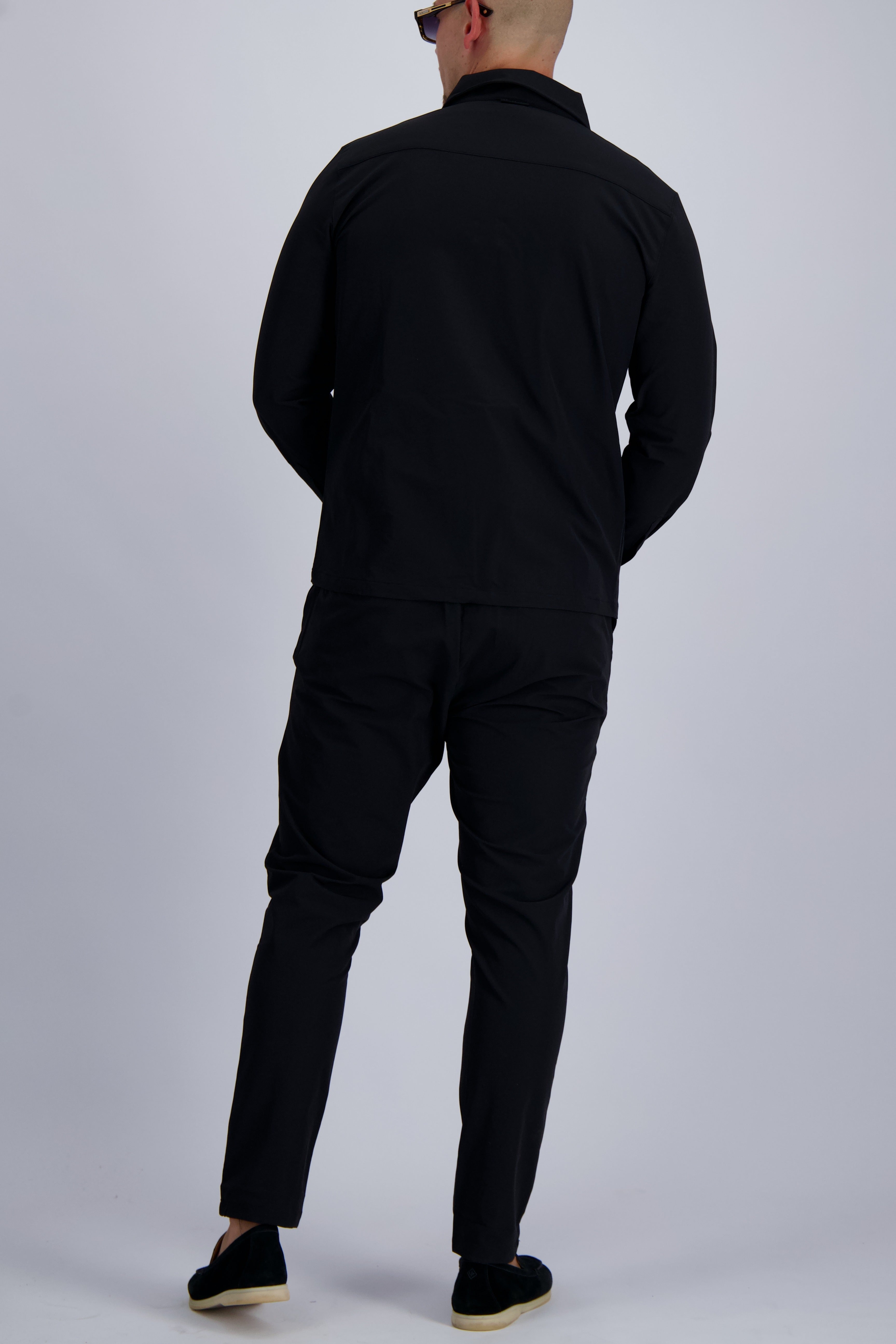 Les Brutes luxury Tech suit inclusing a overshirt and trousers. A premium matching set for men. 