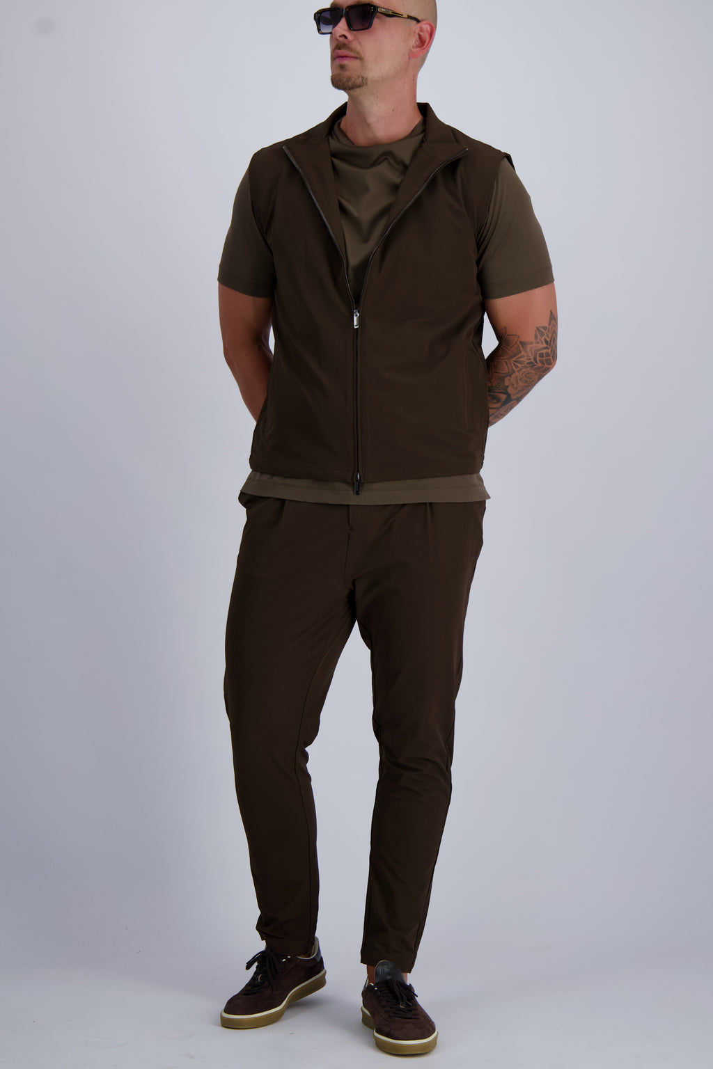 Les Brutes Tech set in dark brown. Matching luxury Tech trousers and bodywarmer.
