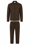 Les Brutes matching tech suit. A jacket and matching trousers in dark brown. Premium quality, crafted with luxury technical fabrics. 