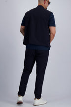 Les Brutes Tech set in Navy. Luxury Bodywarmer and matching trousers with a minimalist design. Crafted with premium fabrics for men who like timeless fashion. 