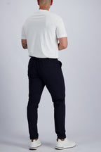 Les Brutes premium Tech trousers in dark blue. Crafted from premium stretch fabric. Essential for men
