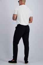 Les Brutes Tech stretch trousers in black. Premium comfortable trousers for men with minimalist design