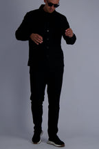 Luxury wool tech overshirt with buttons and chest pockets in black. Crafted with premium fabrics. A timeless design mens wear